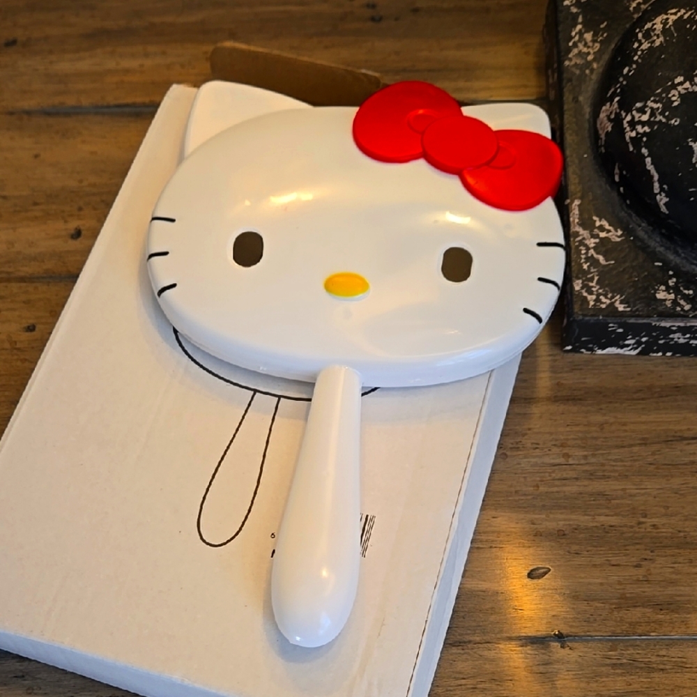Hello kitty mirror hand held large size. New in box